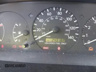 1999 Toyota Camry LE z VIN 4T1BG22K0XU904122, wystawiony jako IAAI lot #42305293 z przebiegiem 243 182 mil mil oraz . Historia ofert i sprzedaży dostępna na DreamBid. Obrazek 7.