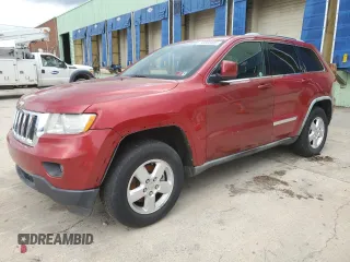 2011 Jeep Grand Cherokee Laredo z VIN 1J4RR4GG4BC575415, wystawiony jako Copart lot #56660405 z przebiegiem 194 717 mil mil oraz Czysty tytuł • Clean title. Historia ofert i sprzedaży dostępna na DreamBid. Obrazek 1.