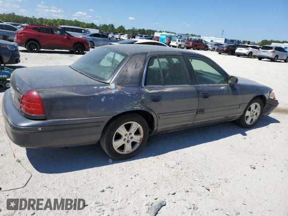 2004 Ford Crown Victoria LX z VIN 2FAFP74W44X112942, wystawiony jako Copart lot #50484665 z przebiegiem 248 480 mil mil oraz Szkoda całkowita • Salvage title. Historia ofert i sprzedaży dostępna na DreamBid. Obrazek 3.