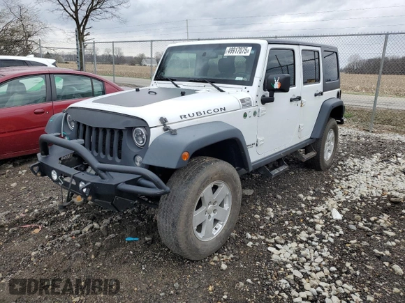 2014 Jeep Wrangler Unlimited Rubicon с VIN 1C4BJWFG9EL150370, выставлен на аукционе Copart как лот 49917075 с пробегом 110 756 миль миль и Списание • Salvage title. История ставок и продаж доступна на DreamBid. Изображение 1.