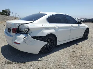 2016 BMW 5 Series 528i with VIN WBA5A5C5XGD526403, listed as a Copart auction lot 60992835 with 106,004 mi miles and Salvage title. Bid and sale history available at DreamBid. Image 3.