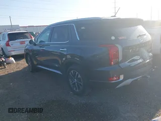 2021 Hyundai Palisade SEL z VIN KM8R24HE1MU194945, wystawiony jako IAAI lot #41987070 z przebiegiem 77 331 mil mil oraz . Historia ofert i sprzedaży dostępna na DreamBid. Obrazek 3.