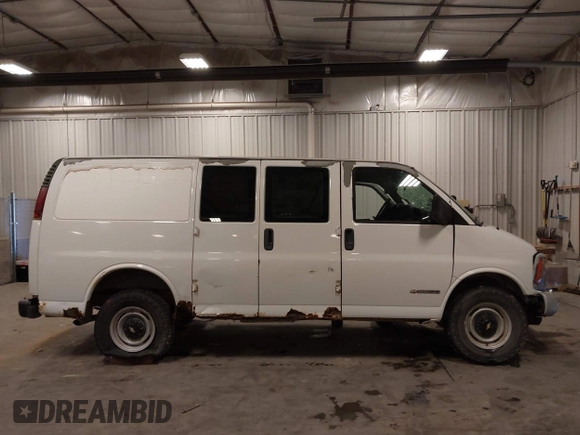 2002 Chevrolet Express Cargo with VIN 1GCHG35R421191281, listed as a IAAI auction lot 42207627 with 212,417 mi miles and . Bid and sale history available at DreamBid. Image 14.