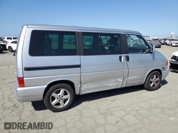 2002 Volkswagen EuroVan MV with VIN WV2MB470X2H068241, listed as a Copart auction lot 51183275 with 194,130 mi miles and Salvage Title. Bid and sale history available at DreamBid. Image 3.