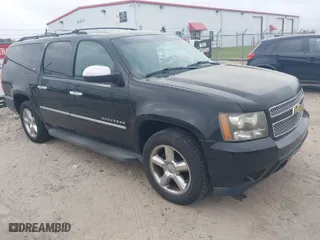 2011 Chevrolet Suburban LTZ with VIN 1GNSCKE02BR335898, listed as a IAAI auction lot 41969140 with 225,598 mi miles. Bid and sale history available at carsss.com. Image 1.