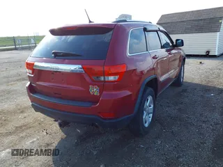 2013 Jeep Grand Cherokee Laredo with VIN 1C4RJEAG9DC538259, listed as a IAAI auction lot 41832676 with 143,000 mi miles. Bid and sale history available at carsss.com. Image 4.
