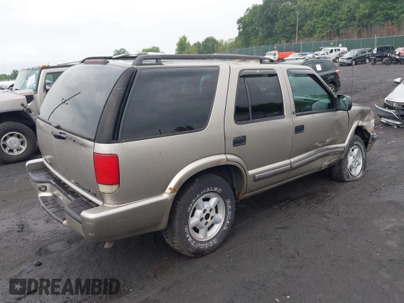 2000 Chevrolet Blazer LT with VIN 1GNDT13W9YK287456, listed as a IAAI auction lot 42450504 with 139,649 mi miles and . Bid and sale history available at DreamBid. Image 4.