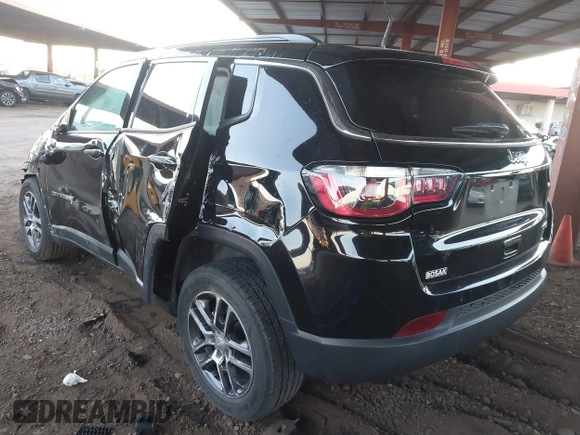 2018 Jeep Compass Latitude with VIN 3C4NJCBBXJT467997, listed as a IAAI auction lot 41871545 with 79,352 mi miles and . Bid and sale history available at DreamBid. Image 3.