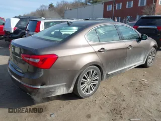 2014 Kia Cadenza Premium with VIN KNALN4D71E5139798, listed as a IAAI auction lot 41761521 with 170,055 mi miles. Bid and sale history available at carsss.com. Image 4.