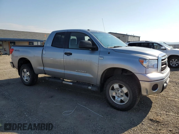 2010 Toyota Tundra 4WD Truck with VIN 5TFUM5F12AX004028, listed as a Copart auction lot 66986614 with 208,393 mi miles and Salvage Title. Bid and sale history available at carsss.com. Image 4.