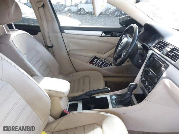 2012 Volkswagen Passat SE w/Sunroof with VIN 1VWBM7A39CC101522, listed as a IAAI auction lot 41484783 with 198,622 mi miles. Bid and sale history available at carsss.com. Image 5.