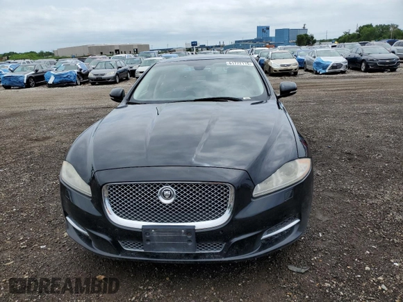 2013 Jaguar XJ с VIN SAJWJ1CD8D8V52463, выставлен на аукционе Copart как лот 61772115 с пробегом 123 899 миль миль и Чистый • Clean title. История ставок и продаж доступна на DreamBid. Изображение 5.