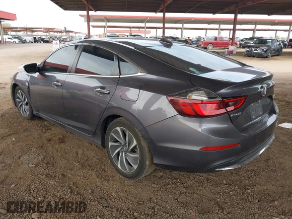 2020 Honda Insight Touring with VIN 19XZE4F94LE007115, listed as a IAAI auction lot 41819370 with 53,774 mi miles and . Bid and sale history available at carsss.com. Image 3.