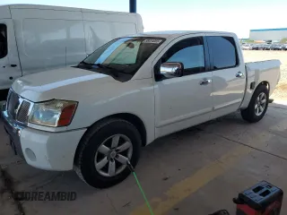 2007 Nissan Titan XE z VIN 1N6AA07A17N210794, wystawiony jako Copart lot #58034055 z przebiegiem 147 171 mil mil oraz Szkoda całkowita • Salvage title. Historia ofert i sprzedaży dostępna na DreamBid. Obrazek 1.
