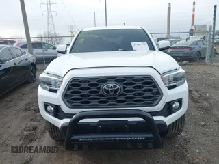 2023 Toyota Tacoma SR5 z VIN 3TMDZ5BN2PM144461, wystawiony jako IAAI lot #41565934 z przebiegiem 75 547 mil mil oraz . Historia ofert i sprzedaży dostępna na DreamBid. Obrazek 12.