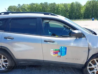 2015 Jeep Cherokee Sport z VIN 1C4PJLAB4FW730836, wystawiony jako IAAI lot #42517979 z przebiegiem 144 383 mil mil oraz . Historia ofert i sprzedaży dostępna na DreamBid. Obrazek 13.