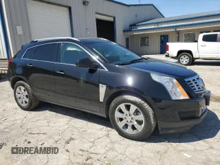 2014 Cadillac SRX Luxury Collection z VIN 3GYFNEE32ES647165, wystawiony jako Copart lot #52331335 z przebiegiem 27 277 mil mil oraz Szkoda całkowita • Salvage title. Historia ofert i sprzedaży dostępna na DreamBid. Obrazek 4.