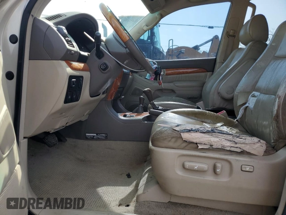 2003 Lexus GX 470 z VIN JTJBT20XX30010271, wystawiony jako Copart lot #52812575 z przebiegiem 291 394 mil mil oraz Szkoda całkowita • Salvage title. Historia ofert i sprzedaży dostępna na DreamBid. Obrazek 7.