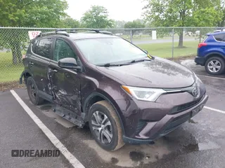 2018 Toyota RAV4 LE with VIN 2T3BFREV9JW857284, listed as a IAAI auction lot 42448480 with 85,551 mi miles and . Bid and sale history available at DreamBid. Image 6.