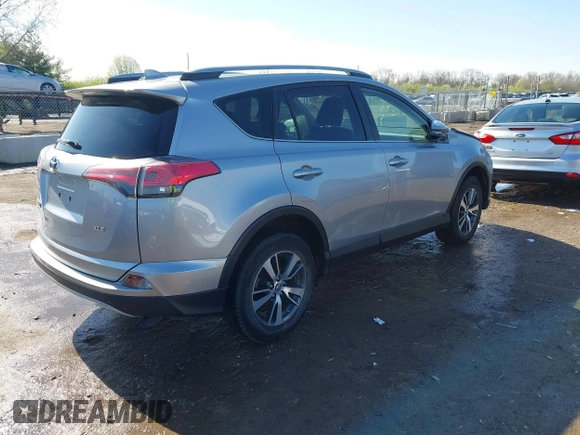 2018 Toyota RAV4 XLE with VIN JTMWFREV3JD120189, listed as a IAAI auction lot 41976999 with 62,182 mi miles and . Bid and sale history available at carsss.com. Image 4.