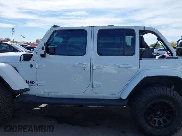 2021 Jeep Wrangler Unlimited Sahara with VIN 1C4JJXP63MW716690, listed as a IAAI auction lot 42087879 with 40,889 mi miles and . Bid and sale history available at DreamBid. Image 14.