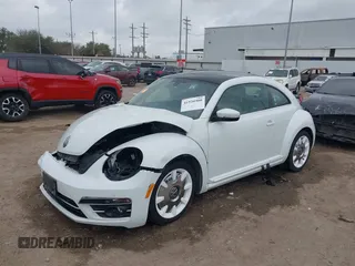 2019 Volkswagen Beetle S with VIN 3VWFD7AT2KM701622, listed as a IAAI auction lot 41520300 with 1 mi miles. Bid and sale history available at carsss.com. Image 2.