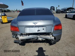 2014 Bentley Flying Spur z VIN SCBEC9ZA7EC090575, wystawiony jako Copart lot #57110315 z przebiegiem 19 083 mil mil oraz Szkoda całkowita • Salvage title. Historia ofert i sprzedaży dostępna na DreamBid. Obrazek 6.