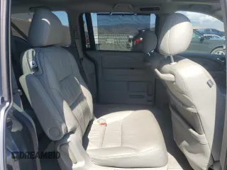 2007 Honda Odyssey Touring z VIN 5FNRL38857B041567, wystawiony jako Copart lot #49644435 z przebiegiem 219 052 mil mil oraz Szkoda całkowita • Salvage title. Historia ofert i sprzedaży dostępna na DreamBid. Obrazek 11.