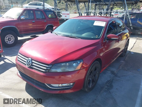 2015 Volkswagen Passat Limited Edition Edition z VIN 1VWAT7A3XFC117991, wystawiony jako IAAI lot #41947059 z przebiegiem 111 981 mil mil oraz . Historia ofert i sprzedaży dostępna na DreamBid. Obrazek 19.