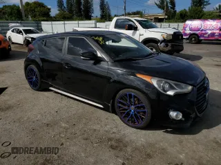 2016 Hyundai Veloster Turbo with VIN KMHTC6AE7GU279107, listed as a Copart auction lot 77386233 with 105,872 mi miles. Bid and sale history available at carsss.com. Image 4.