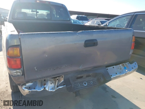 2000 Toyota Tundra SR5 with VIN 5TBRT3413YS019873, listed as a IAAI auction lot 41412497 with 305,472 mi miles and . Bid and sale history available at DreamBid. Image 6.