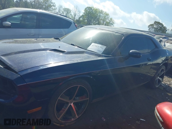 2013 Dodge Challenger SXT z VIN 2C3CDYAG2DH587643, wystawiony jako IAAI lot #41964792 z przebiegiem 179 791 mil mil oraz . Historia ofert i sprzedaży dostępna na DreamBid. Obrazek 14.