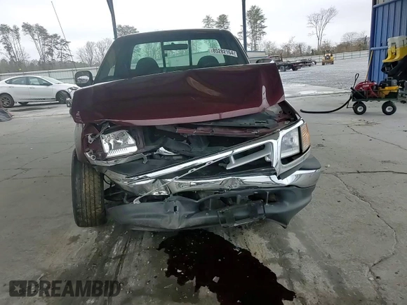 1999 Ford F-150 XL with VIN 2FTRF17L0XCB19827, listed as a Copart auction lot 85282164 with 52,103 mi miles and Salvage title. Bid and sale history available at DreamBid. Image 11.
