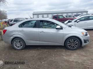 2012 Chevrolet Sonic LT with VIN 1G1JC5SH1C4136526, listed as a IAAI auction lot 41880812 with 169,587 mi miles and . Bid and sale history available at DreamBid. Image 13.