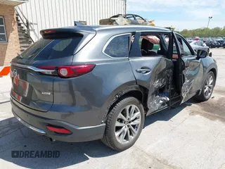2016 Mazda CX-9 Signature with VIN JM3TCBEY2G0124433, listed as a IAAI auction lot 42194154 with 108,945 mi miles and . Bid and sale history available at DreamBid. Image 4.