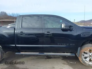 2018 Nissan Titan XD SV with VIN 1N6BA1F49JN521838, listed as a IAAI auction lot 41606878 with 143,742 mi miles. Bid and sale history available at carsss.com. Image 14.