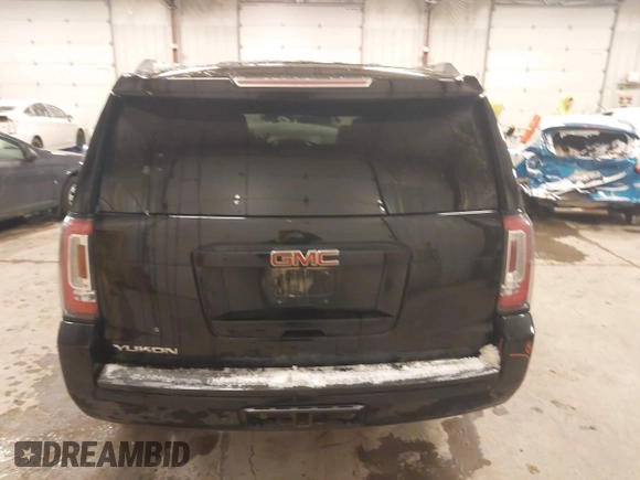 2016 GMC Yukon SLE with VIN 1GKS2AKC1GR276262, listed as a IAAI auction lot 41336378 with 213,182 mi miles. Bid and sale history available at carsss.com. Image 16.