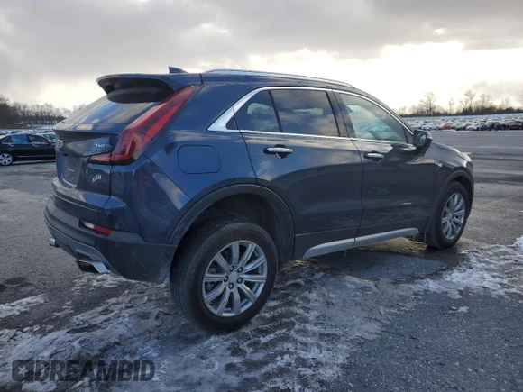 2021 Cadillac XT4 AWD Premium Luxury with VIN 1GYFZDR4XMF007080, listed as a Copart auction lot 87943335 with 36,379 mi miles and Salvage Title. Bid and sale history available at carsss.com. Image 3.