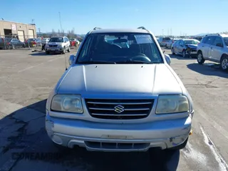 2003 Suzuki XL7 Touring z VIN JS3TX92V734114162, wystawiony jako IAAI lot #41250622 z przebiegiem 227 494 mil mil oraz . Historia ofert i sprzedaży dostępna na DreamBid. Obrazek 13.
