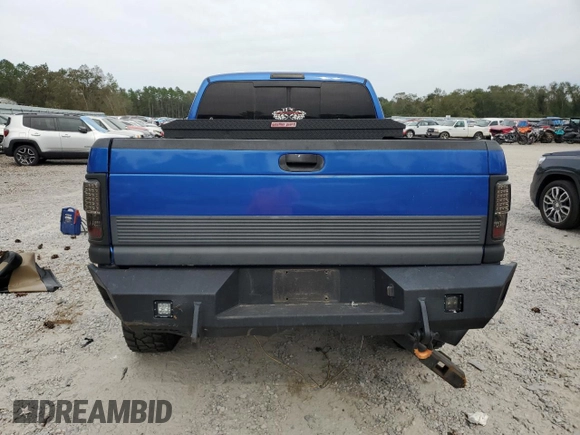 1999 Dodge Ram 2500 with VIN 1B7KF2363XJ504002, listed as a Copart auction lot 73557954 with 297,618 mi miles and Salvage Title. Bid and sale history available at carsss.com. Image 6.