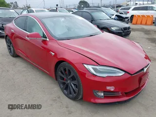 2019 Tesla Model S 100D with VIN 5YJSA1E46KF332066, listed as a IAAI auction lot 42189828 with 55,751 mi miles and . Bid and sale history available at DreamBid. Image 1.