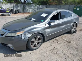 2009 Acura TL Technology z VIN 19UUA96579A005856, wystawiony jako IAAI lot #42117231 z przebiegiem 180 503 mil mil oraz . Historia ofert i sprzedaży dostępna na DreamBid. Obrazek 17.