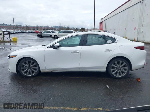2020 Mazda 3 Premium with VIN 3MZBPBEMXLM133357, listed as a IAAI auction lot 41540234 with 81,280 mi miles and . Bid and sale history available at DreamBid. Image 15.