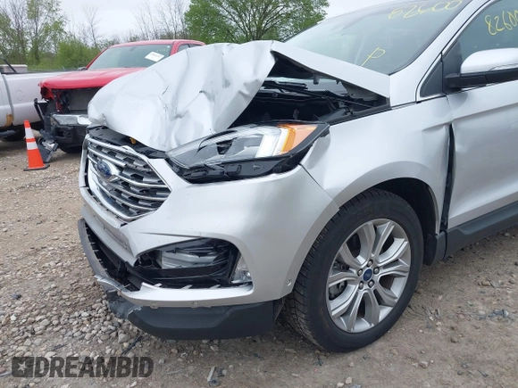 2019 Ford Edge Titanium with VIN 2FMPK4K99KBB56336, listed as a IAAI auction lot 42282600 with 52,422 mi miles and . Bid and sale history available at DreamBid. Image 6.