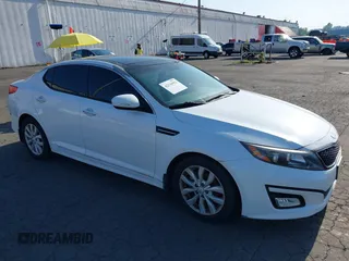 2014 Kia Optima EX with VIN 5XXGN4A73EG314797, listed as a IAAI auction lot 42136952 with 71,310 mi miles and . Bid and sale history available at carsss.com. Image 1.