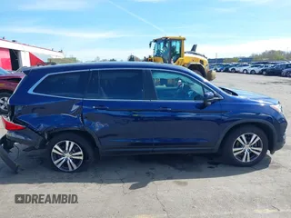 2016 Honda Pilot EX-L with VIN 5FNYF6H5XGB102213, listed as a IAAI auction lot 41861702 with 119,655 mi miles. Bid and sale history available at carsss.com. Image 13.