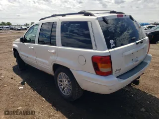 2003 Jeep Grand Cherokee Limited with VIN 1J4GW58N83C511981, listed as a Copart auction lot 61734014 with 174,775 mi miles and Salvage Title. Bid and sale history available at carsss.com. Image 2.