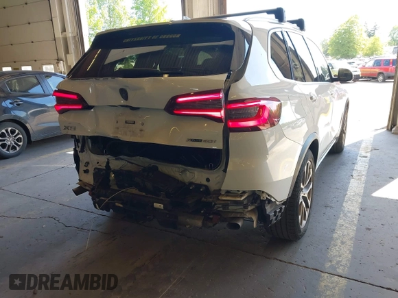 2022 BMW X5 xDrive40i with VIN 5UXCR6C09N9M21945, listed as a IAAI auction lot 42170363 with 23,537 mi miles and . Bid and sale history available at DreamBid. Image 21.
