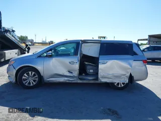 2014 Honda Odyssey EX-L with VIN 5FNRL5H63EB041106, listed as a IAAI auction lot 42294113 with 122,610 mi miles and . Bid and sale history available at DreamBid. Image 15.