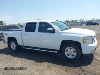 2013 Chevrolet Silverado 1500 LTZ with VIN 3GCPKTE24DG123063, listed as a IAAI auction lot 42061675 with 221,813 mi miles and . Bid and sale history available at DreamBid. Image 13.